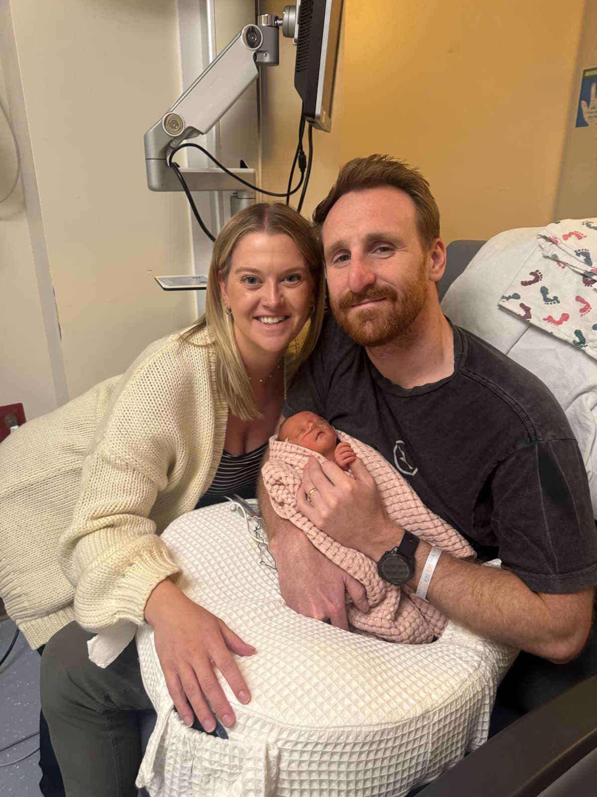 Allie and Tanner, founders of NestReady, with their daughter Nora